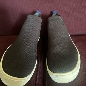 Rothy’s black slip on sneakers 9.5